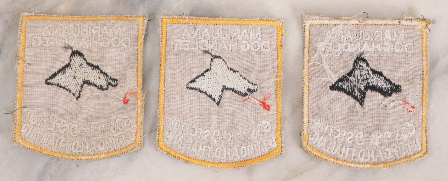 Lot 205 - Grouping Of Six Vintage Vietnam Era Marijuana Doghandler United States Air Force 635th K-9 Section, Thailand Embroidered Patches With Silhouette Of Dog Smoking Joint