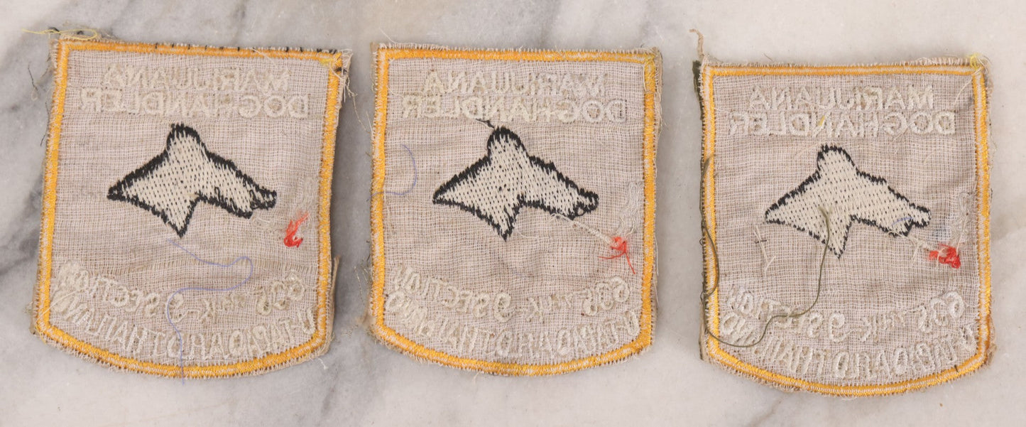 Lot 205 - Grouping Of Six Vintage Vietnam Era Marijuana Doghandler United States Air Force 635th K-9 Section, Thailand Embroidered Patches With Silhouette Of Dog Smoking Joint