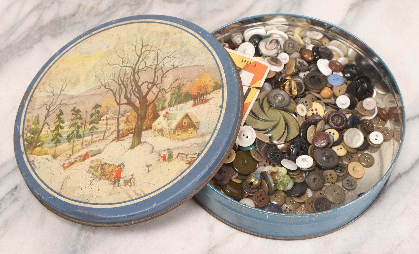 Lot 210 - Vintage Tin With Winter Scene Full Of Buttons, 8-1/4" Diameter