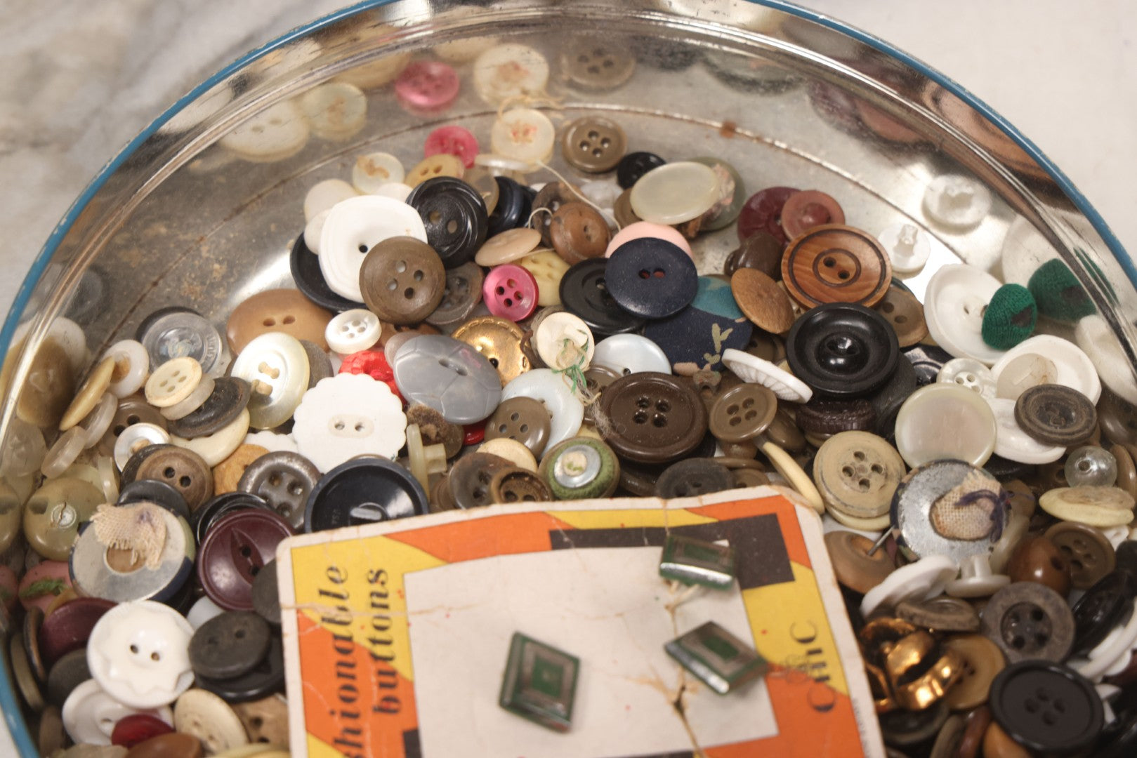 Lot 210 - Vintage Tin With Winter Scene Full Of Buttons, 8-1/4" Diameter