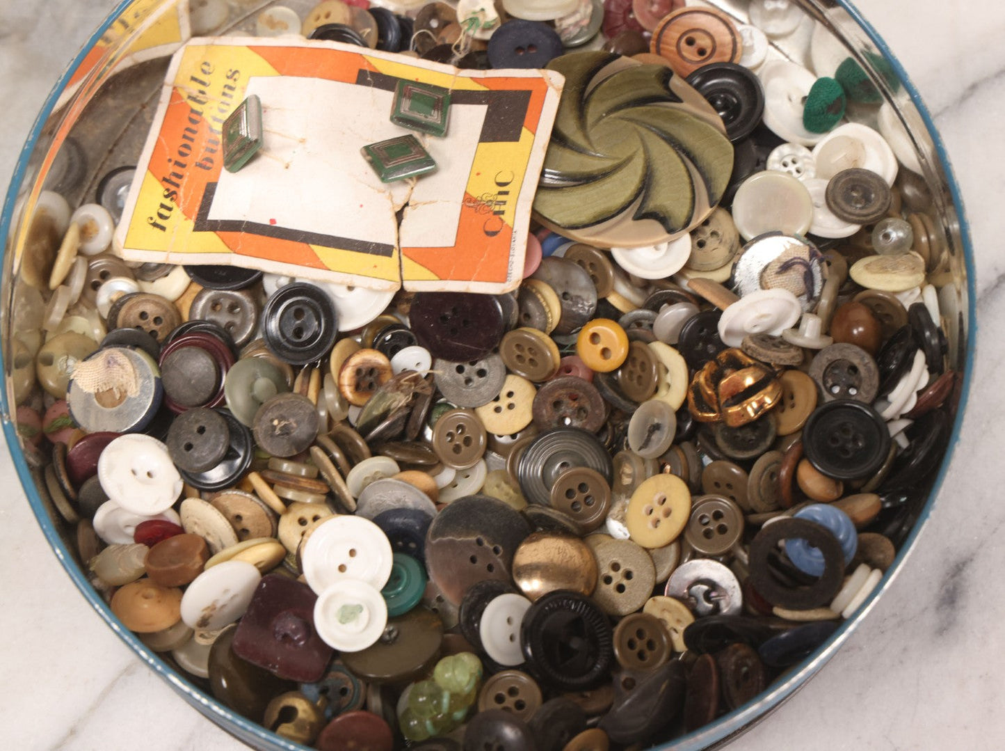 Lot 210 - Vintage Tin With Winter Scene Full Of Buttons, 8-1/4" Diameter