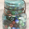 Lot 211 - Vintage Mason Jar Full Of Marbles With Wire Bail Closure