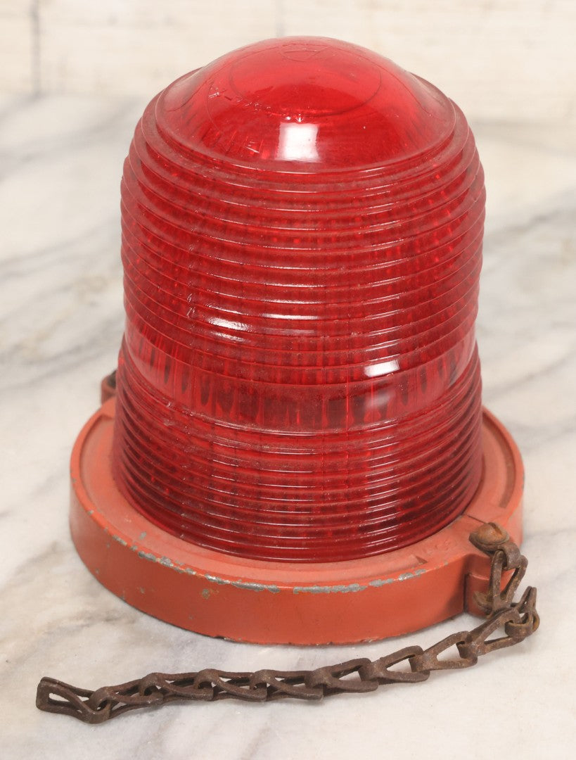 Lot 212 - Vintage Red Glass Warning Light Lens With Orange Painted Metal Base And Chain, 5-1/4" H