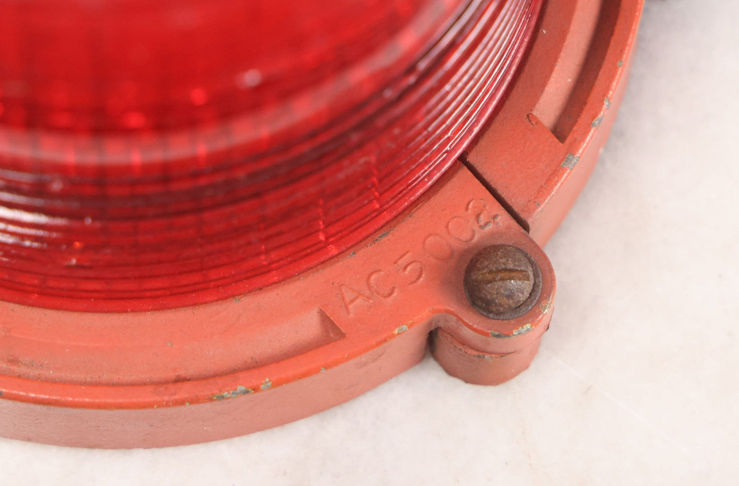 Lot 212 - Vintage Red Glass Warning Light Lens With Orange Painted Metal Base And Chain, 5-1/4" H