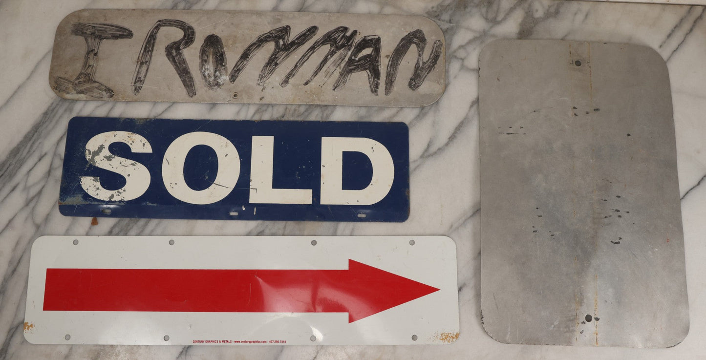 Lot 214 - Grouping Of Four Modern Outdoor Metal Signs: "Next Left" With "Ironman" Letters In Black Marker On Verso, Speed Limit 5 Mph, And Double-Sided Red Arrow And Sold Signs