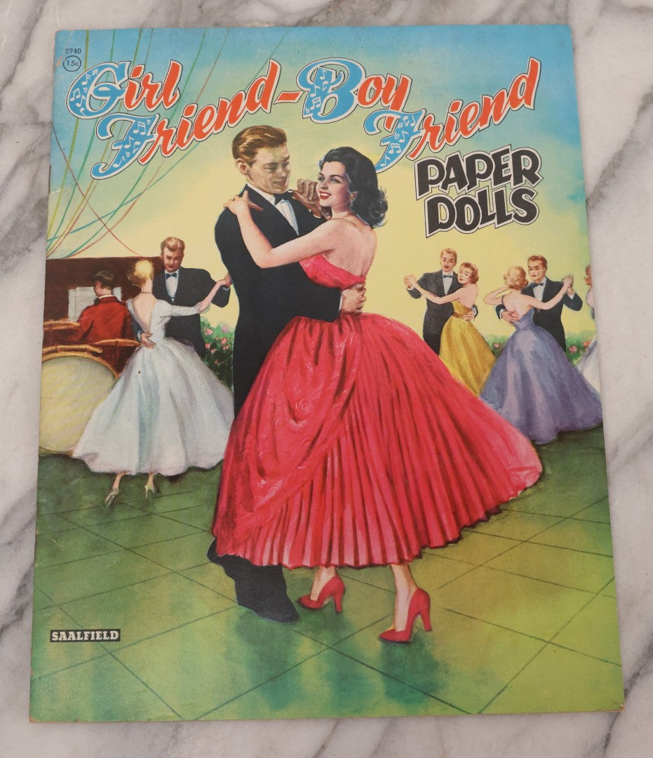 Lot 221 - Vintage "Girl Friend-Boy Friend" Paper Doll Book By Saalfield, Circa 1950s Chromolithographed Fashions Including Party Time, Football Game, House Party, And Outdoor Fun