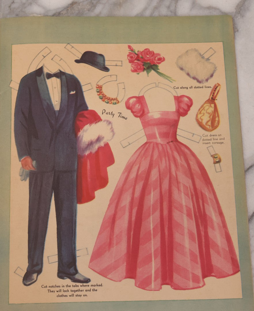 Lot 221 - Vintage "Girl Friend-Boy Friend" Paper Doll Book By Saalfield, Circa 1950s Chromolithographed Fashions Including Party Time, Football Game, House Party, And Outdoor Fun