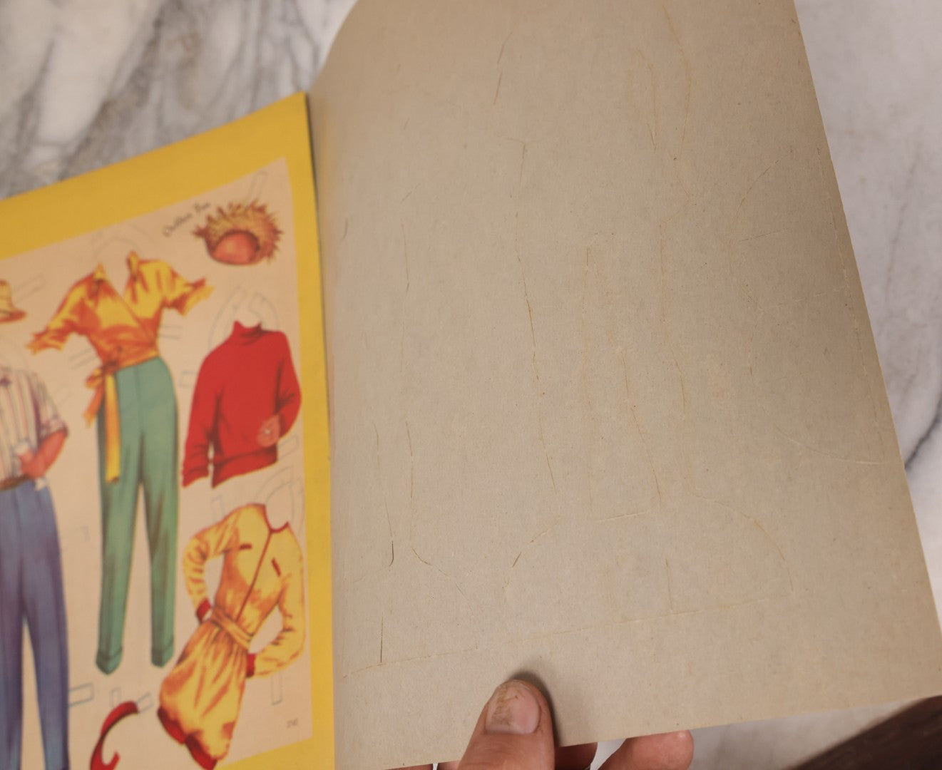 Lot 221 - Vintage "Girl Friend-Boy Friend" Paper Doll Book By Saalfield, Circa 1950s Chromolithographed Fashions Including Party Time, Football Game, House Party, And Outdoor Fun