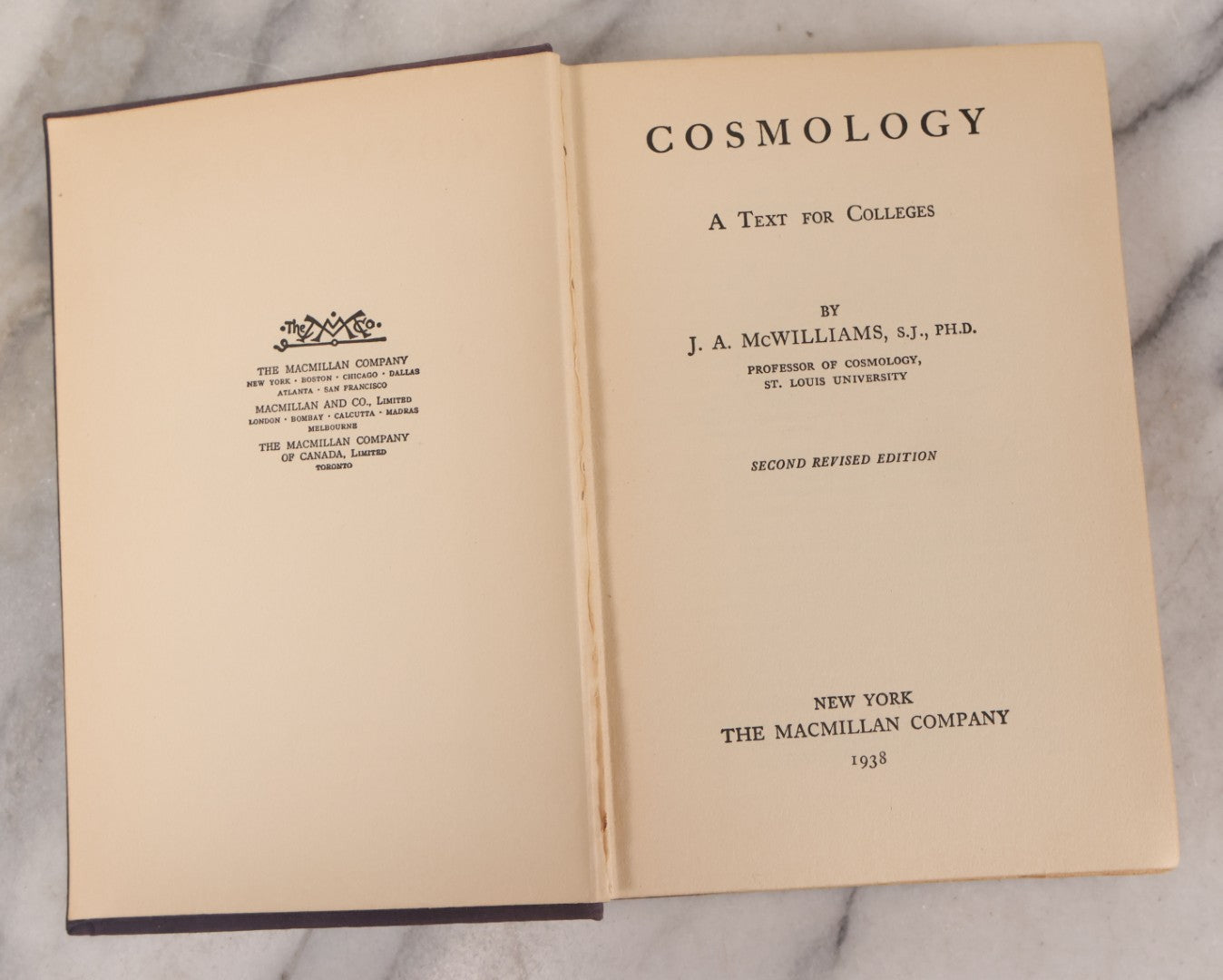 Lot 231 - "Cosmology: A Text For Colleges" Vintage Cosmology Textbook By J. A. McWilliams, Published By The Macmillan Company, New York, 1938