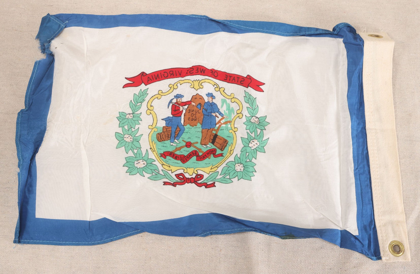 Lot 219 - Vintage State Of West Virginia Yacht Flag With State Coat Of Arms, Laurel Wreath, And "Montani Semper Liberi" Motto