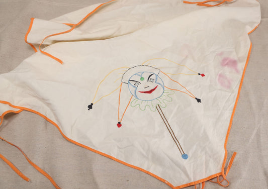 Lot 222 - Vintage Hand-Embroidered Card Table Cover With Joker Figure And Playing Card Suit Symbols, Orange Binding With Corner Ties