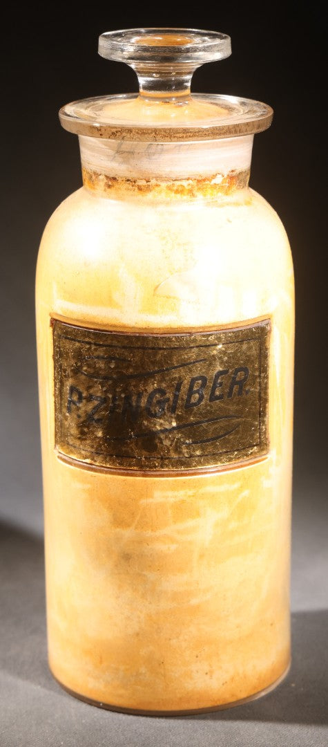 Lot 016 - Antique Apothecary Glass Jar, "P. Zingiber" (Powdered Ginger), Reverse-Painted Gold Glass Label, Glass Stopper, Manufactured By Whitall Tatum Company, U.S.A..