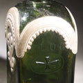 Lot 019 - Vintage Green Glass Flask Bottle Marked "C.L.O.C." With Applied Pewter Decorative Overlay, Beaded Arch With Iron Cross Cartouche On Front And Back, Scrollwork On Sides, 6-1/2" H