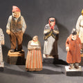 Lot 034 - Grouping Of Eight Vintage Folk Art Hand-Carved And Painted Wooden Figures In Traditional Dress, Up To 4-1/2" H