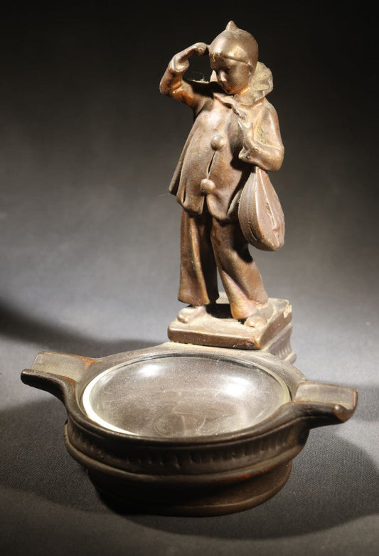 Lot 052 - Antique Copper-Clad Composition Figural Ashtray, Standing Pierrot Clown Holding A Lute, Glass Tray Insert, 6-5/8" H