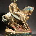 Lot 055 - Vintage Chalkware Equestrian Figural Statuette, George Washington On Horseback, Star-Bordered Oval Base, Polychrome Gold, Blue, And Red Paint, 10-1/4" H