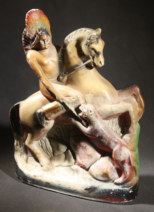 Lot 056 - Vintage Chalkware Equestrian Figural Statuette, Native American Figure In War Bonnet On Rearing Horse Spearing A Mountain Lion, Polychrome Paint, 11-1/4" H
