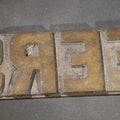 Lot 057 - Antique Bronze Printing Plate, "Jefferson" In Relief Block Letters, Milled Surface, Bowed, 16-1/4" L
