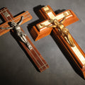 Lot 065 - Pair Of Vintage Wood Crucifixes, One With Metal Inlay And One Last Rites Sick Call Set With Candles And Holy Water Bottle