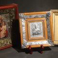 Lot 077 - Trio Of Vintage Framed Eastern Orthodox Icons Including Madonna And Child With Jeweled Border, Christ Pantocrator With Funeral Prayer Card, And Silver-Toned Saint Nicholas Relief