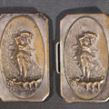 Lot 081 - Antique Silver-Plated Two-Piece Belt Buckle With Embossed Figural Woman Carrying Water Jug In Garden Setting