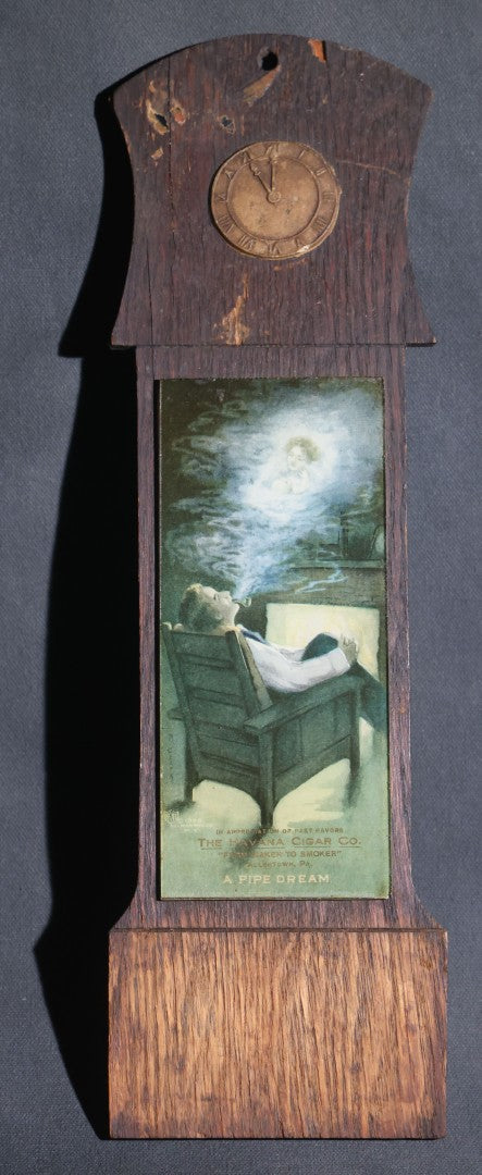 Lot 084 - Antique The Havana Cigar Co. "A Pipe Dream" Advertising Calendar Holder, "From Maker To Smoker," Allentown, Pennsylvania, Ullman Mfg. Co. Print In Oak Wall Frame With Clock Face, Copyright 1909