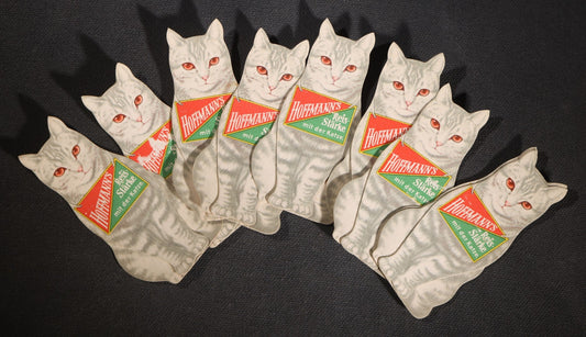 Lot 089 - Grouping Of Eight Antique Hoffmann's Reis-Starke Die-Cut Cat-Shaped Folding Paper Advertisements, "Hoffmann's Reis-Starke Mit Der Katze" ("Hoffmann's Rice Starch With The Cat")