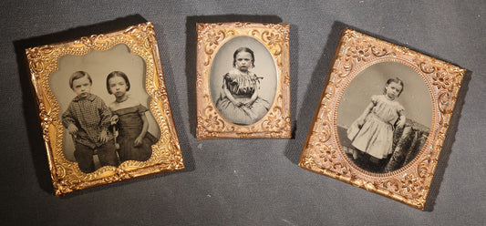 Lot 116 - Trio Of Antique Uncased Photograph Portraits Of Children, 1/6th Plate Ambrotype Of Siblings, 1/9th Plate Tintype Of A Seated Young Girl, And 1/6th Plate Ruby Ambrotype Of A Standing Young Girl, Ornate Brass Mats