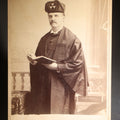 Lot 126 - Antique Cabinet Card Photograph Of A Middle-Aged Man In Dark Ceremonial Robe With Black Cross, Cap Bearing Cross-And-Triangle Devices, Holding A Book, Photographed By Veeder, Albany, New York