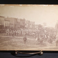 Lot 131 - Antique Board-Mounted Panoramic Photograph Of A Parade On Main Street, Storm Lake, Iowa, Photographed By Coman, Crowds, Horseback Rider, And American Flag