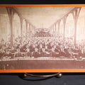 Lot 132 - Antique Board-Mounted Photograph Of A Large Assembly Hall Interior With Rows Of Seated Young Men, Banners For Eastmore College, Bank Of Poughkeepsie, And Tenth National Bank Of Boston