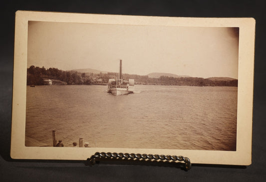 Lot 135 - Antique Board-Mounted Photograph Of The "Lady Of The Lake" Steamboat On Lake Winnipesaukee, New Hampshire, Passengers On Deck, Dock And Mountains In Background