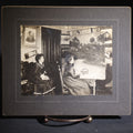 Lot 136 - Antique Board-Mounted Occupational Photograph Of A Woman Painting A Landscape At An Easel In A Parlor, Second Woman With Cat In Lap, Pencil-Inscribed "Lorna Penfold And Her Momma"