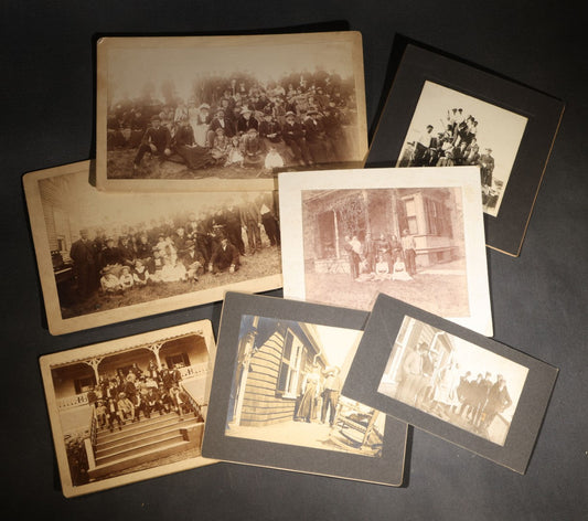 Lot 144 - Grouping Of Seven Antique Board-Mounted Photographs Of Outdoor Group Gatherings, Including Large Hillside Assembly, Men's Outing With Bottles And Basket, And Men In Aprons