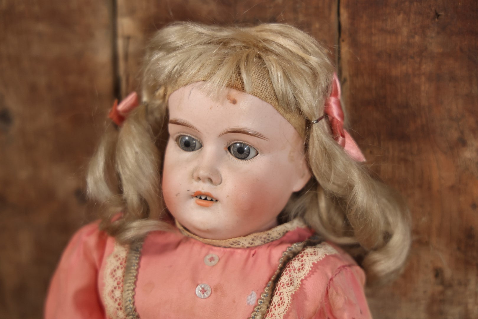 Antique Bisque Head Doll With Pink Dress, Blonde Hair, Note Heavy Wear, Loose Limbs, Needs Restoration, Likely German, Marked "Majestic"