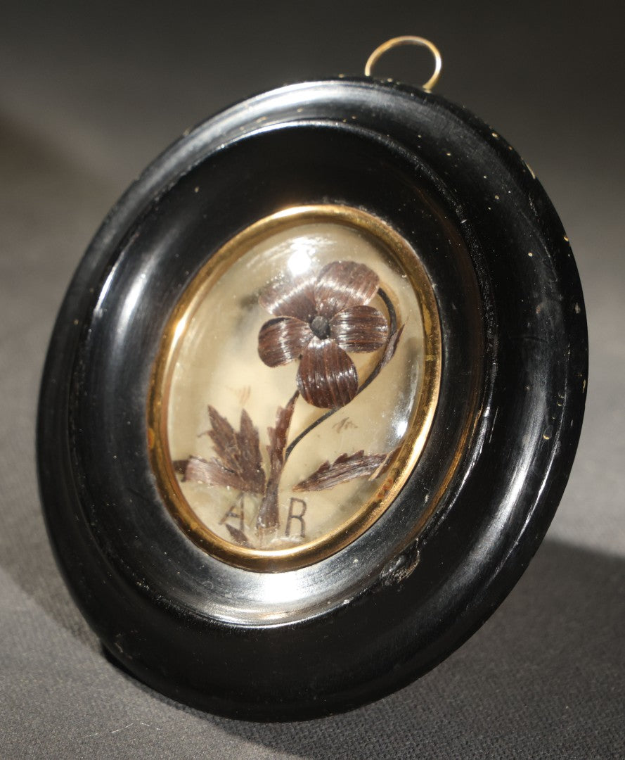 Antique French Hair Work Keepsake Palette Under Convex Glass, Floral Motif with Initials "A R," Inscribed "Annee 1885" ("Year 1885") on Reverse