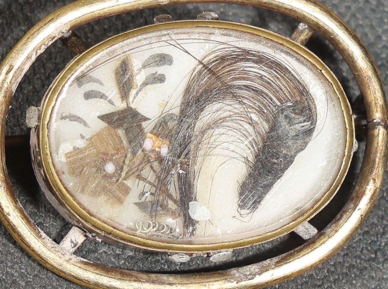 Antique Victorian Hair Work Keepsake Brooch with Floral Palette Under Convex Glass in Gold-Tone Oval Setting