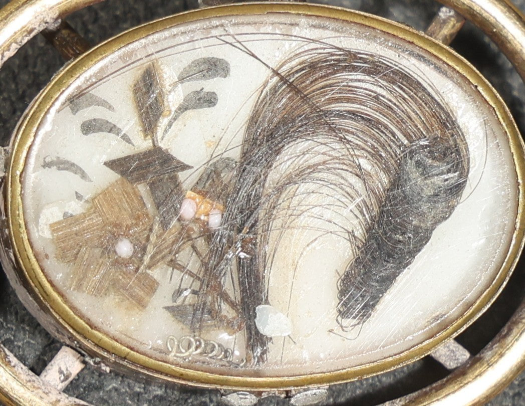 Antique Victorian Hair Work Keepsake Brooch with Floral Palette Under Convex Glass in Gold-Tone Oval Setting