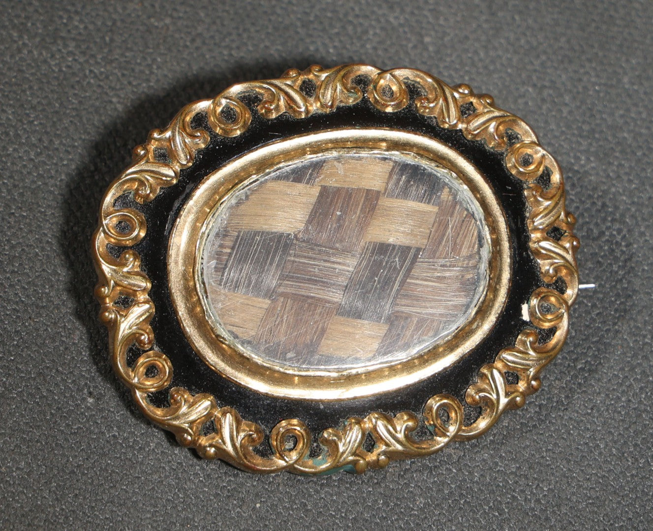 Antique Victorian Hair Work Keepsake Brooch with Woven Hair Under Glass, Black Enamel Border with Gold-Tone Scroll Frame and Pendant Loop