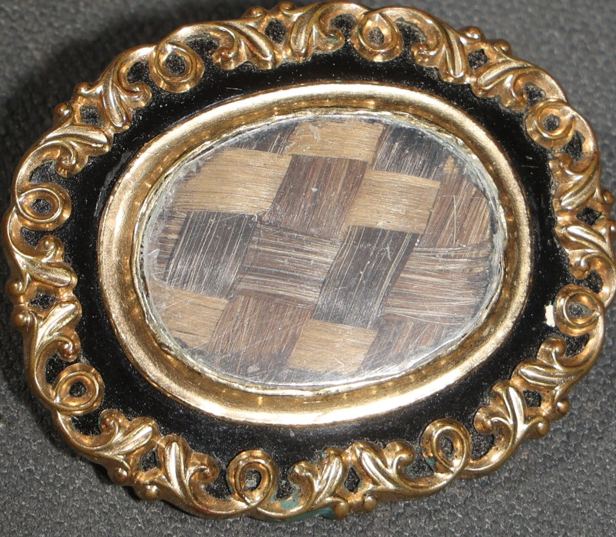 Antique Victorian Hair Work Keepsake Brooch with Woven Hair Under Glass, Black Enamel Border with Gold-Tone Scroll Frame and Pendant Loop