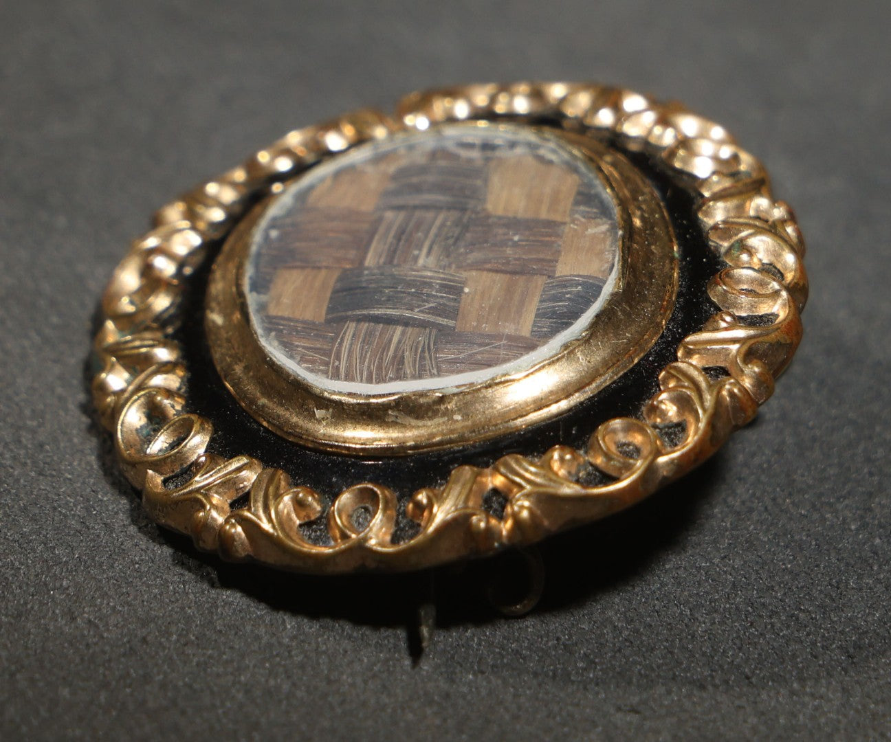 Antique Victorian Hair Work Keepsake Brooch with Woven Hair Under Glass, Black Enamel Border with Gold-Tone Scroll Frame and Pendant Loop