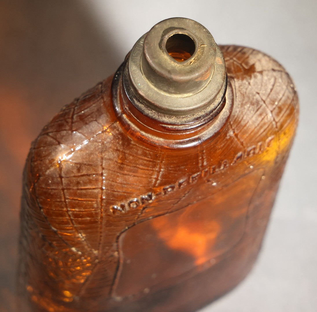 Vintage Embossed Amber Glass Whiskey Bottle with Spider Web, Spider, and Wheat Motifs, Marked "Non Refillable" and "Pat. Pending"