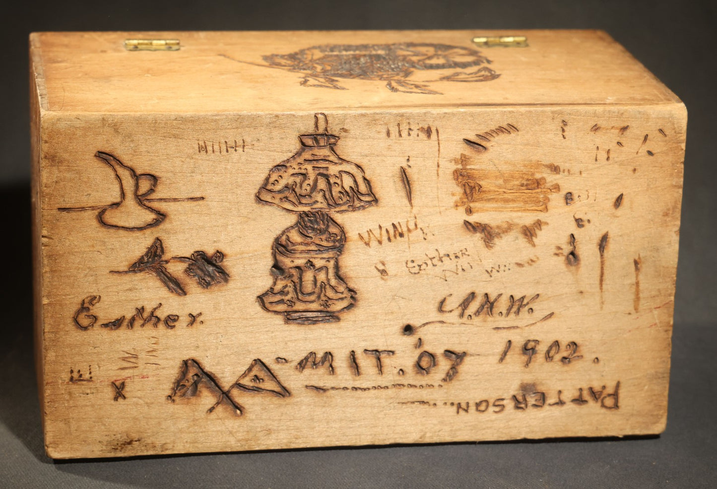 Antique Folk Art Pyrography Box Dated 1902, Inscribed E.M. Wing, W.D. Swan Jr., E. Jamieson, Abbie Wing, and Grandma A. Freeman, Newton, Massachusetts, with M.I.T. '07 Marking, Lamp, Landscape, and Floral Motifs