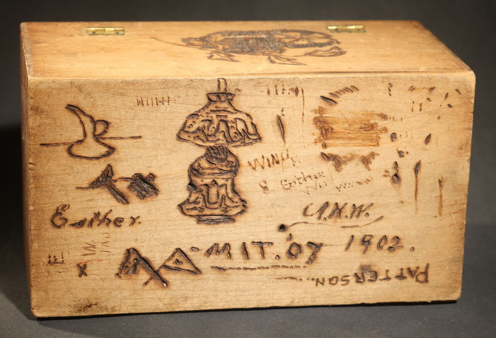 Antique Folk Art Pyrography Box Dated 1902, Inscribed E.M. Wing, W.D. Swan Jr., E. Jamieson, Abbie Wing, and Grandma A. Freeman, Newton, Massachusetts, with M.I.T. '07 Marking, Lamp, Landscape, and Floral Motifs