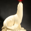 Lot 088 - Vintage Carstairs White Seal Whiskey "the Perfectly Balanced Blend" Chalkware Advertising Figure, Seal Balancing a Translucent Red Ball, 8-1/2" H