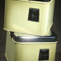 Lot 093 - Pair of Vintage Midcentury Green and Chrome Tin Kitchen Canisters, "Tea" and "Coffee," with Recessed Plastic Lift Handles in Lids, 4-1/2" H Each