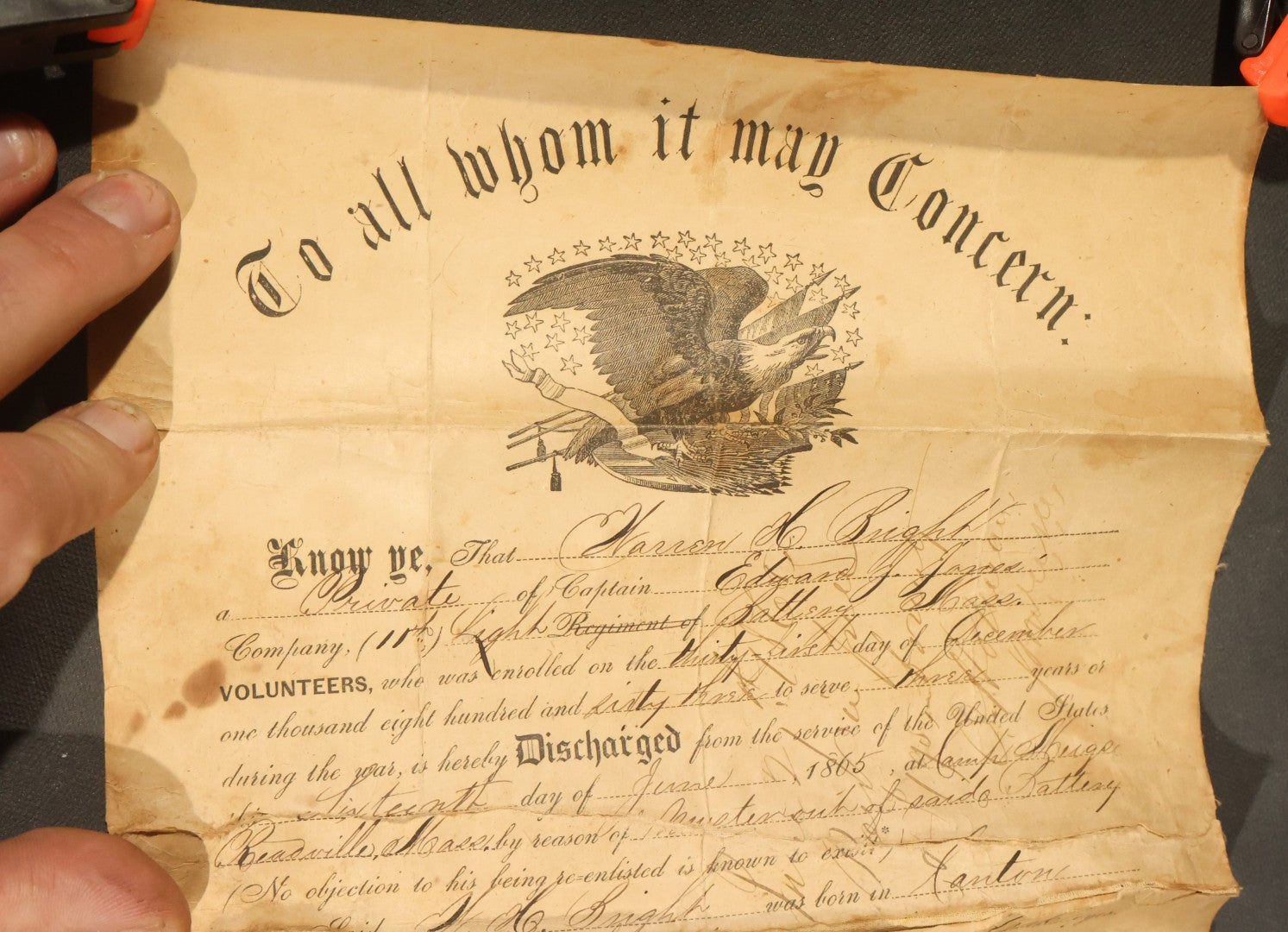 Pair of Antique Civil War Documents, 11th Massachusetts Battery Veteran Volunteers, "Soldiers Memorial" Chromolithograph Roster and Discharge Paper for Warren H. Bright, Captain Edward J. Jones, 1863-1865