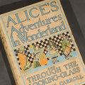 Lot 105 - "Alice's Adventures in Wonderland and Through the Looking-Glass" Antique Photoplay Edition Book by Lewis Carroll, Illustrated with Film Stills from the Nonpareil Feature Film Corporation, Published by Grosset & Dunlap, New York, Circa 1915