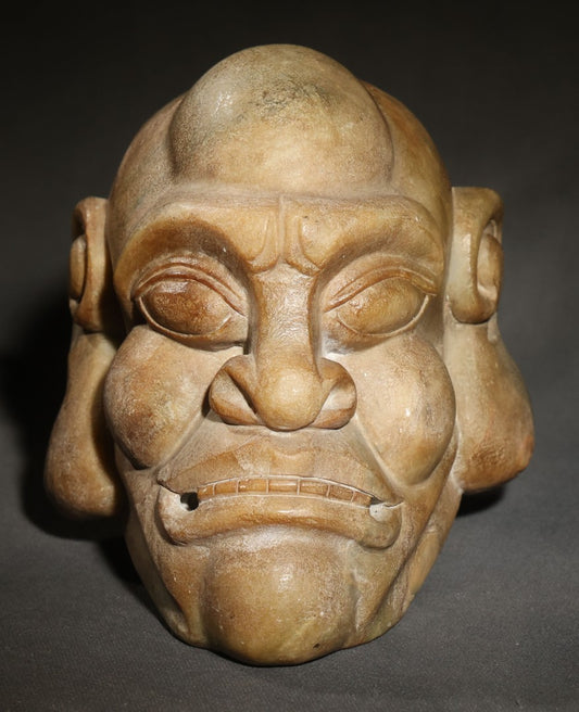 Vintage Carved Stone Grotesque Head with Exaggerated Features and Spiral Ears