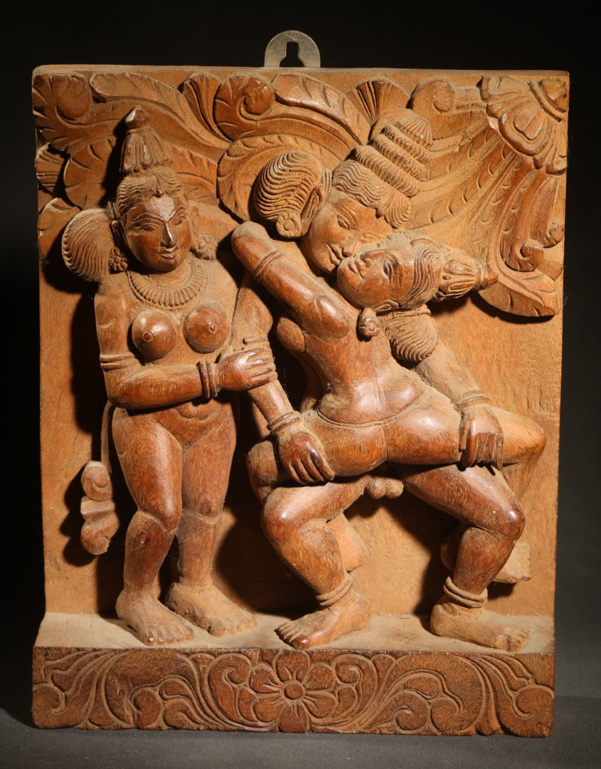Vintage Indian Carved Wood Relief Panel Depicting Three Figures with Erotic Motif, Floral Border